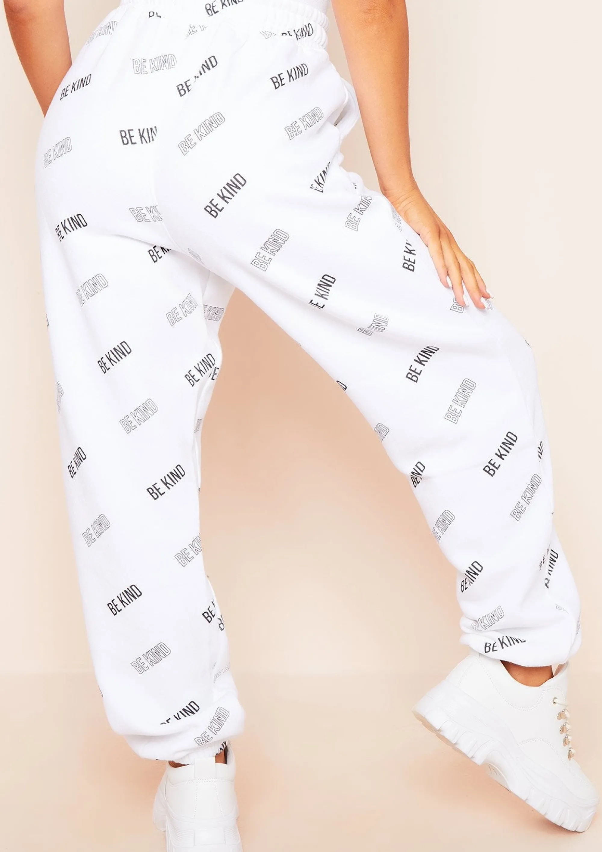 Missy Empire Candice White Be Kind Repetitive Text Oversized Joggers Sale