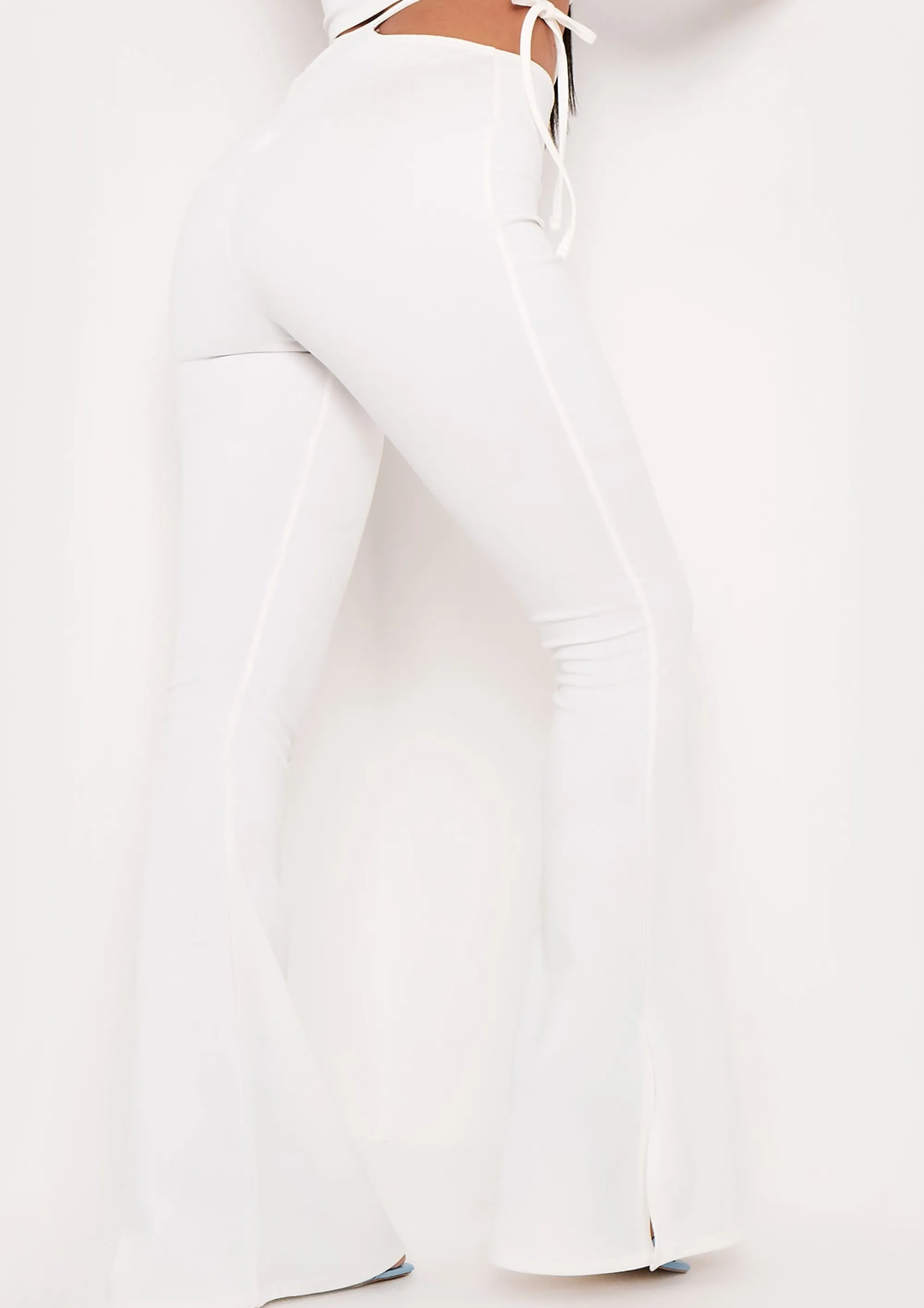 Missy Empire Carmella Ivory Tie Side Strap Detail Cut Out Flared Trousers^Women Trousers