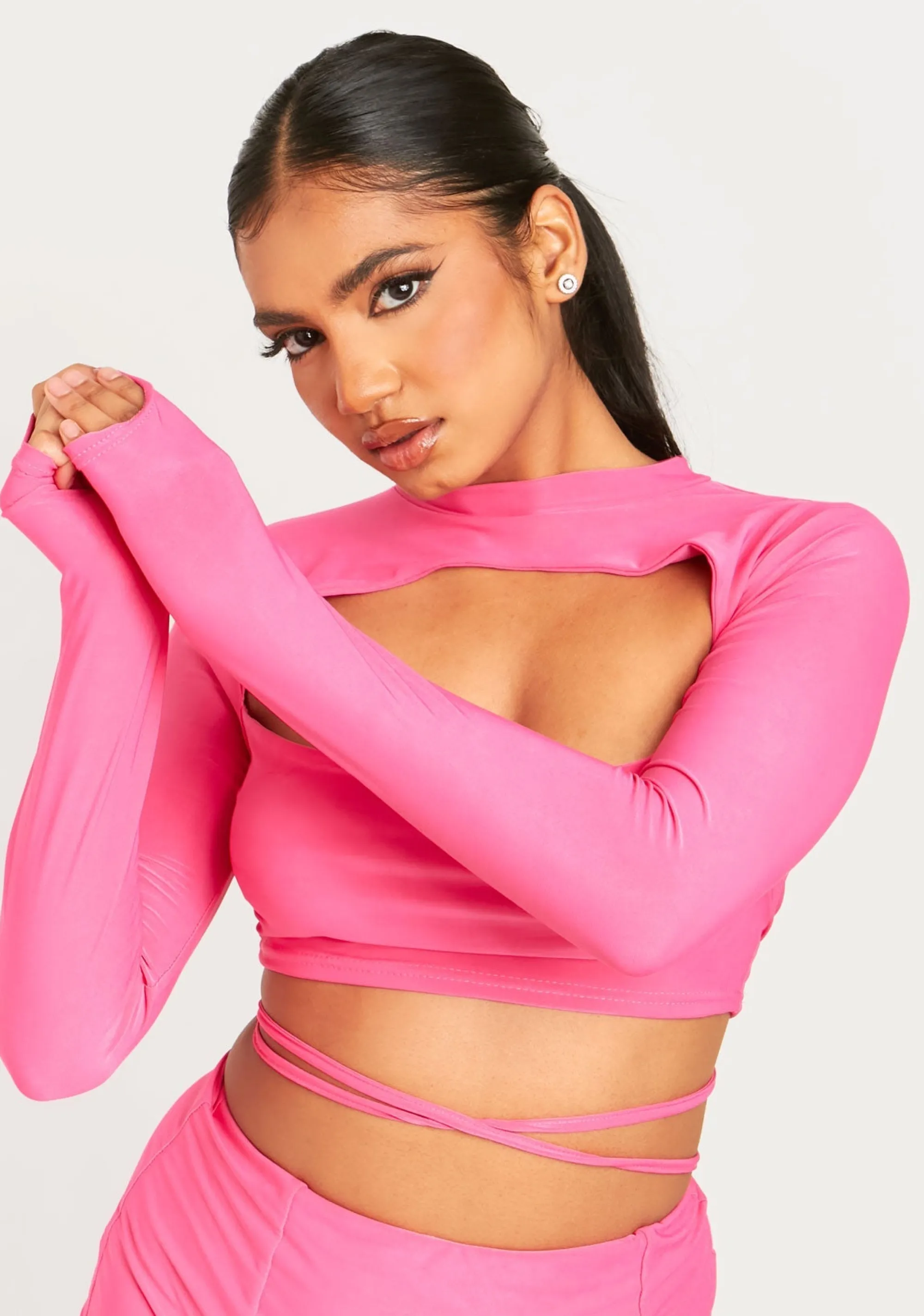 Missy Empire Izzie Pink Cut Out Lace Up Long Sleeve Crop Top Clearance